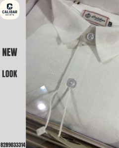 A premium white formal shirt from Calibar Shirts displayed in a box, highlighting its elegant texture and fine detailing.