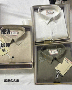 Three premium formal shirts from Calibar Shirts — beige, white, and olive green — neatly packed in boxes, showcasing elegant fabric and fine craftsmanship.