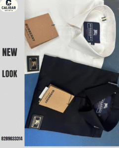 Two folded shirts in black and white shades placed side by side, showcasing a refined and classic wardrobe combination.