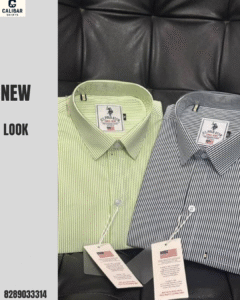 Men’s striped formal shirts in light green and black – premium cotton fabric, neatly folded and tagged for retail display.
